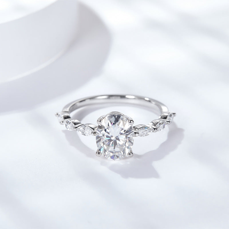 Oval Moissanite Ring for Women, Four-Prong Solitaire Ring with Marquise-Style Side Stones product image