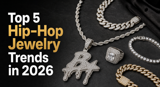Hip-hop jewelry flat lay with iced out chains, Cuban links, pendants, rings, and readable Top 5 Hip-Hop Jewelry Trends in 2026 cover title.