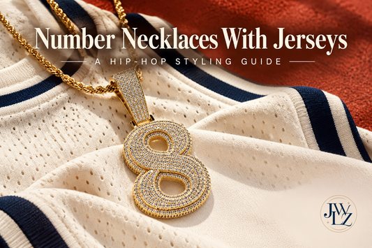 Editorial gold-tone number eight necklace on a cream jersey with navy trim and the title Number Necklaces With Jerseys.