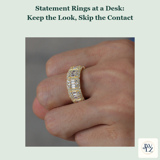 Existing wide CZ band hand photograph on a green cover titled Statement Rings at a Desk Keep the Look Skip the Contact