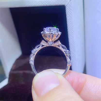 Moissanite Solitaire Ring with Pavé Band and Heart Basket Accent