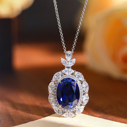 Blue Oval Floral Halo Pendant Necklace with Leaf Cluster Detail