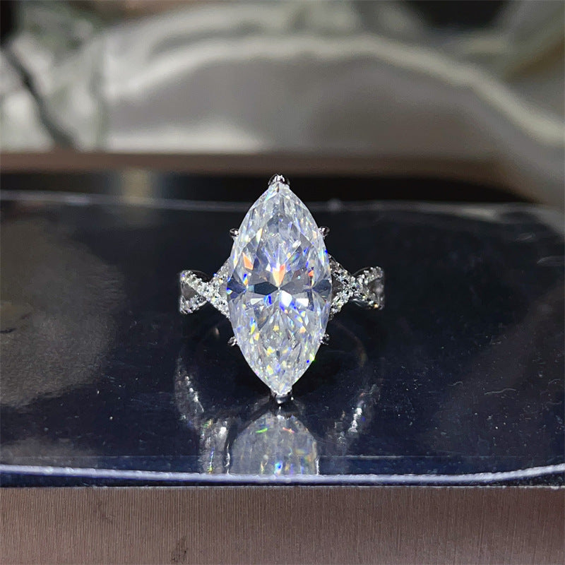 Marquise VVS Moissanite Ring for Women, 10 Carat Solitaire Engagement Ring with Twisted Pavé Band product image