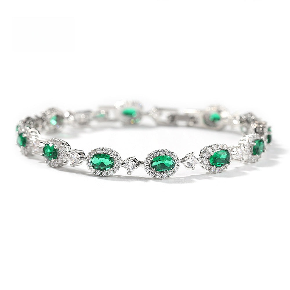 Emerald Green Oval Cubic Zirconia Tennis Bracelet in Gold, Silver & Rose Gold Tone product image