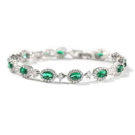 Emerald Green Oval Cubic Zirconia Tennis Bracelet in Gold, Silver & Rose Gold Tone