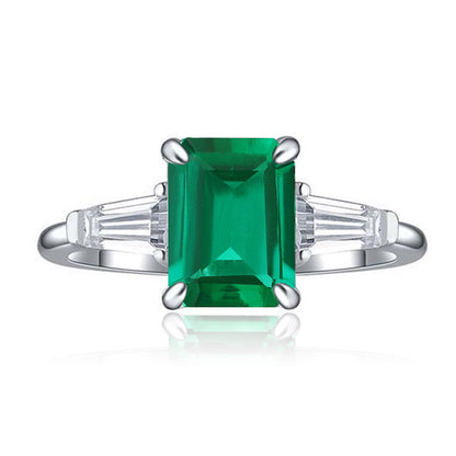 Emerald Green Three-Stone Ring with Baguette Accents