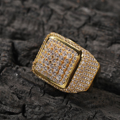 Gold tone square center cubic zirconia statement ring on dark stone
