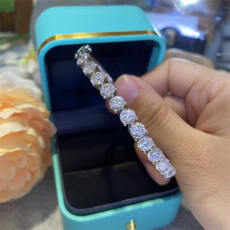 Moissanite Tennis Bangle Bracelet with Round Four-Prong Stones product image