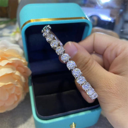Moissanite Tennis Bangle Bracelet with Round Four-Prong Stones