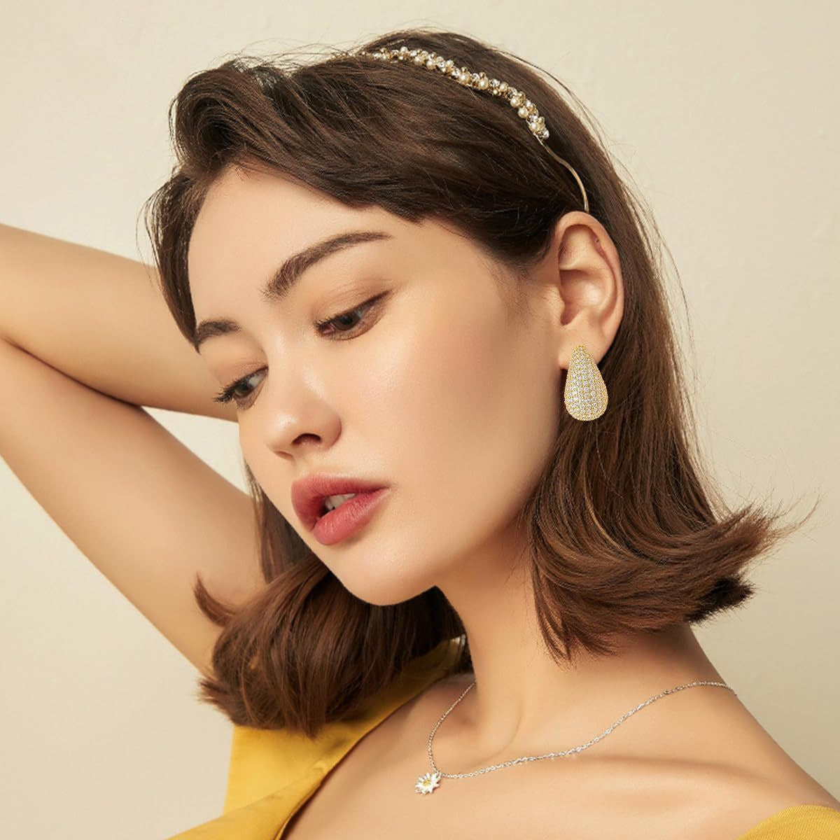 Iced Out Moissanite Teardrop Stud Earrings for Women and Men in Gold Tone or White Platinum Tone product image