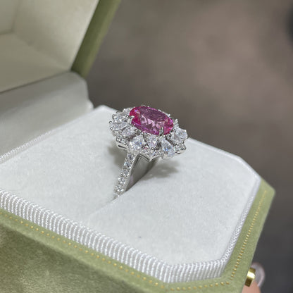Lab-Created Pink Sapphire Oval Halo Ring in 925 Sterling Silver
