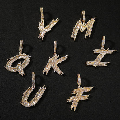 Gold-tone drip script initial assortment
