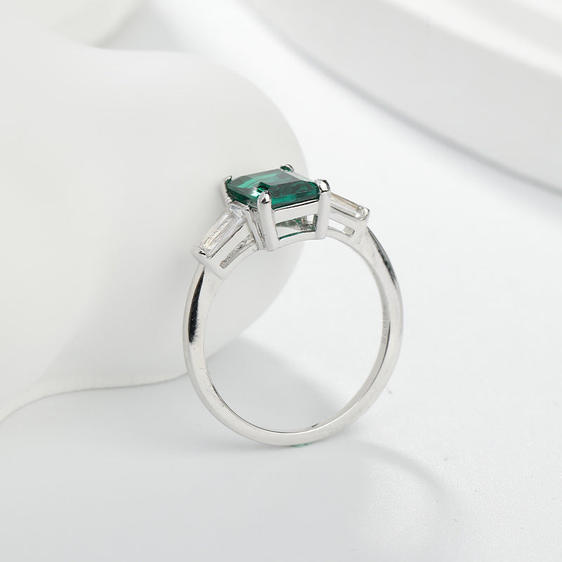 Emerald Green Three-Stone Ring with Baguette Accents product image