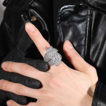 Iced coin cubic zirconia statement ring worn on hand
