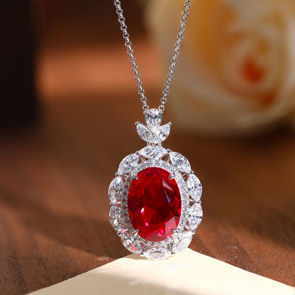 Blue Oval Floral Halo Pendant Necklace with Leaf Cluster Detail