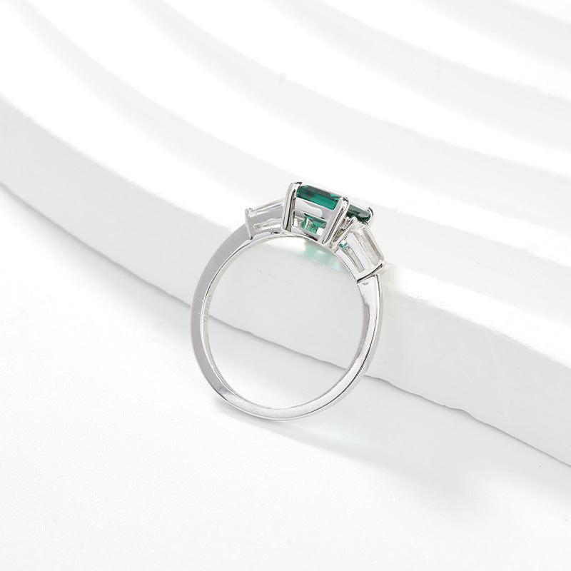 Emerald Green Three-Stone Ring with Baguette Accents product image
