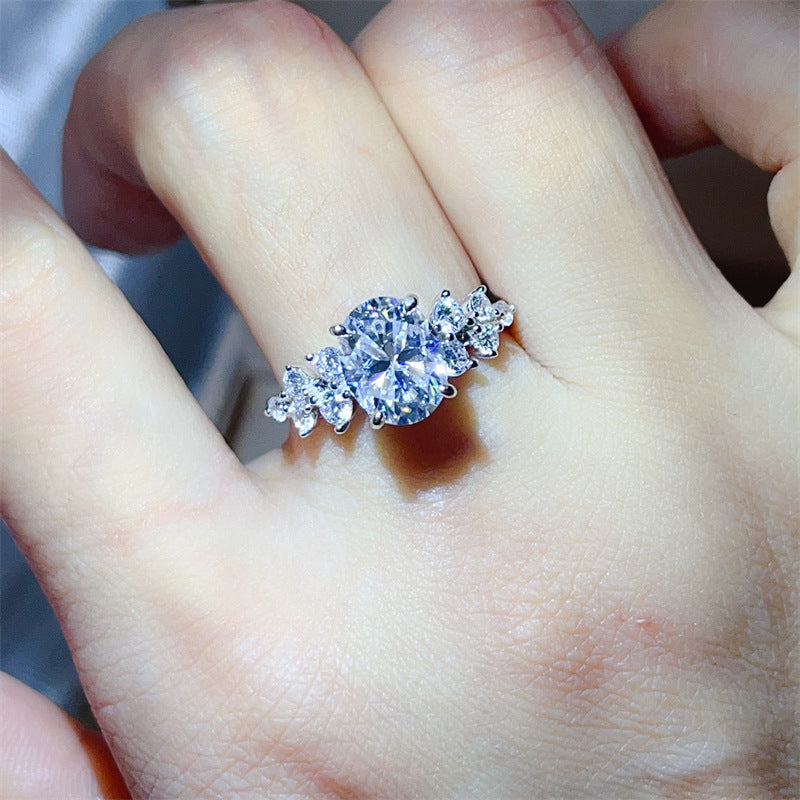 Oval Moissanite Ring for Women with Three-Stone Side Design, Four-Prong Engagement Ring, Sizes 9-20 product image