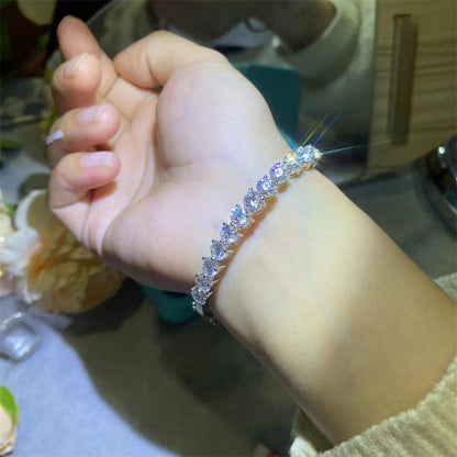 Moissanite Tennis Bangle Bracelet with Round Four-Prong Stones