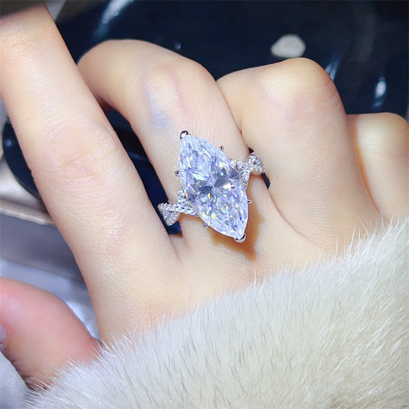 Marquise VVS Moissanite Ring for Women, 10 Carat Solitaire Engagement Ring with Twisted Pavé Band product image