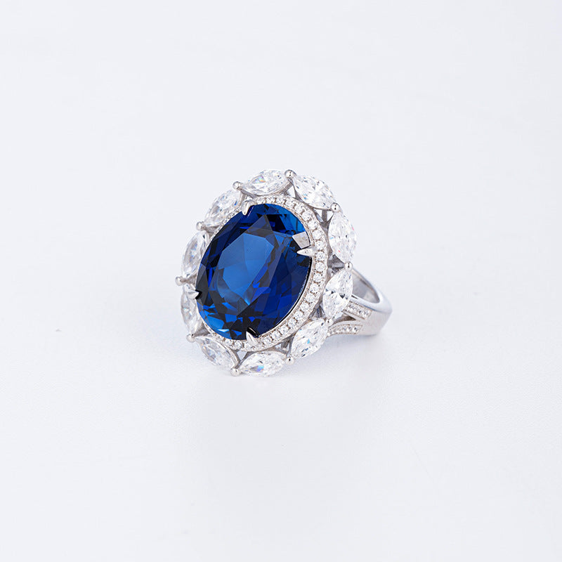 Blue Oval Floral Halo Pendant Necklace with Leaf Cluster Detail product image